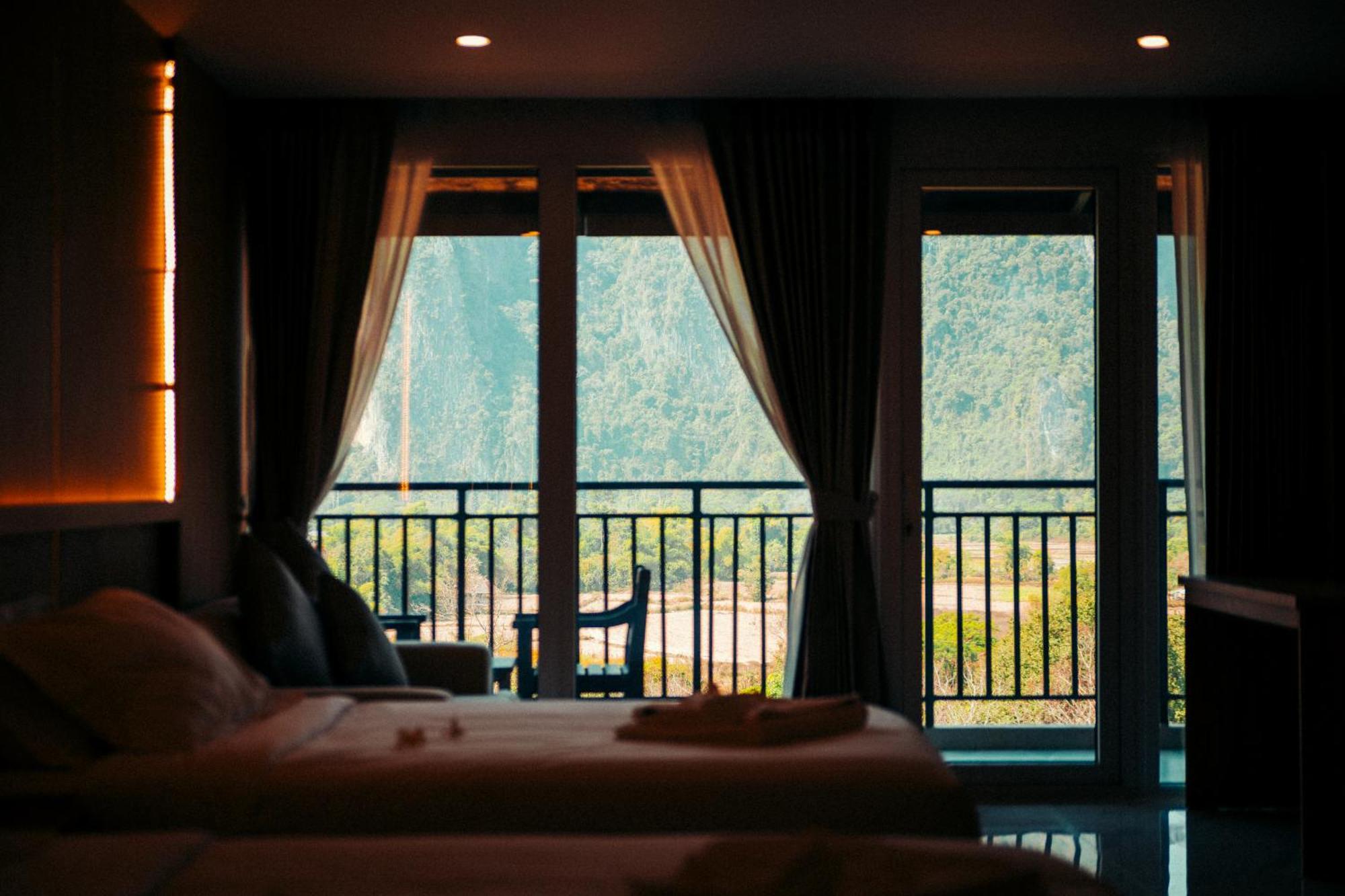 The Elephant Crossing Hotel Vang Vieng Buitenkant foto