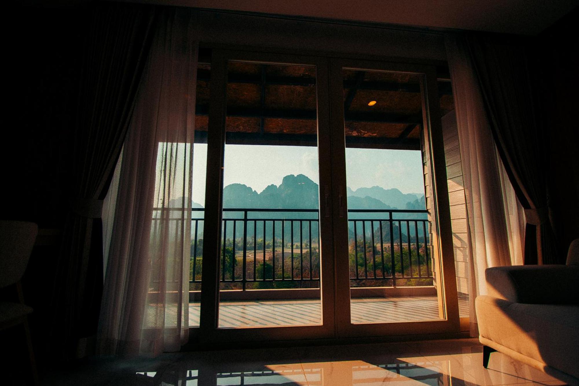 The Elephant Crossing Hotel Vang Vieng Buitenkant foto