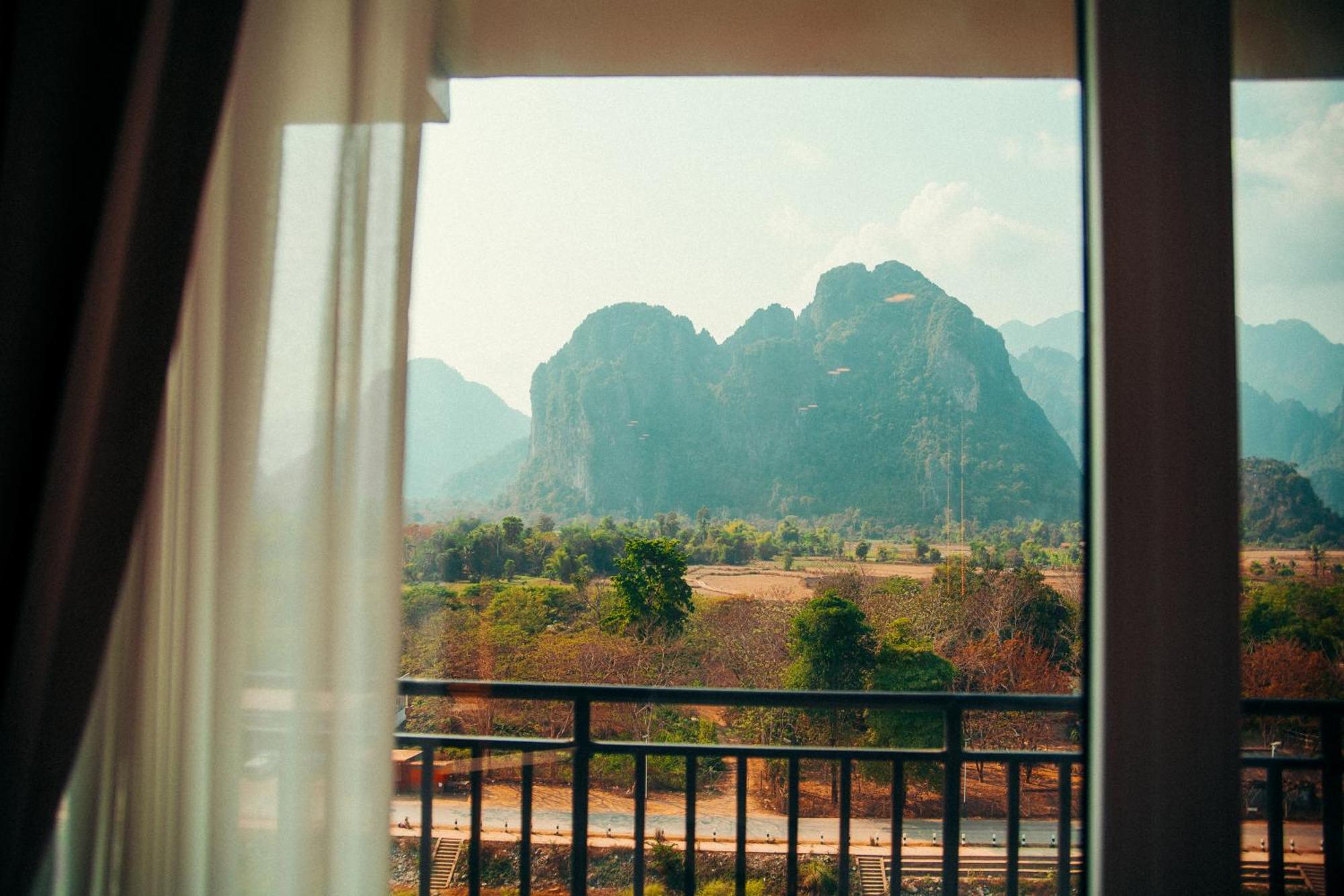 The Elephant Crossing Hotel Vang Vieng Buitenkant foto